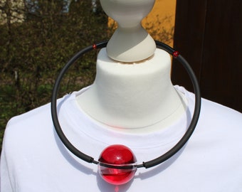 Red  glas and resin statement  avantgarde necklace with black rubber