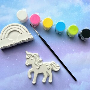 Plaster unicorn magnet to paint and plaster rainbow magnet with 6 acrylic paints and a paint brush.