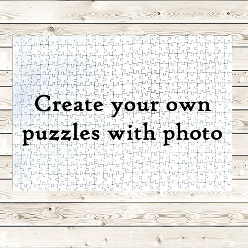 Pode incluir: Um quebra-cabe&ccedil;a branco com o texto "Create your own puzzles with photo" nele.