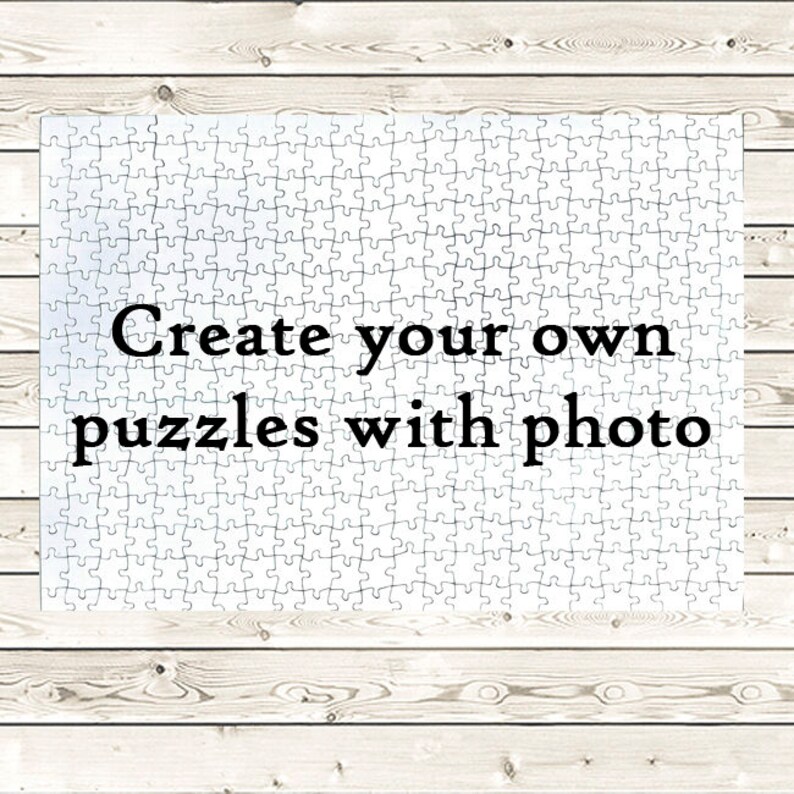 May include: A white jigsaw puzzle with the text "Create your own puzzles with photo" on it.