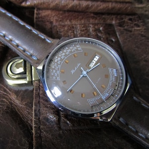 Sowiet watch. Men&#39;s mechanical wrist watch RAKETA (Perpetual Calendar). Export option.A specimen rare. Great view. Successful purchase