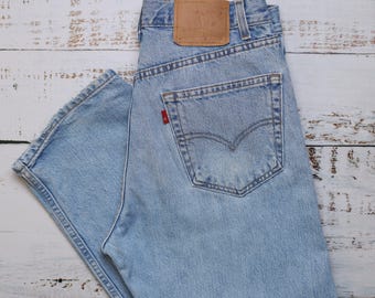 Vintage Levi's jeans size W33 L32, Light blue denim, Blank red tab