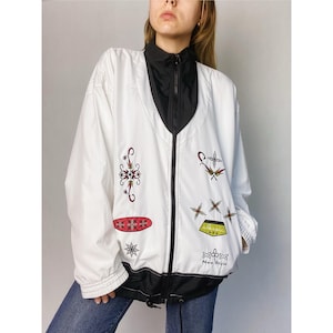 ETIREL White windbreaker jacket with color block motif and abstract print