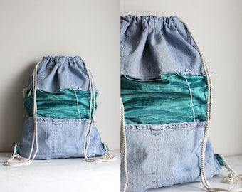 Denim drawstring backpack made out of Levi's jeans, Rucksack with shiny green details