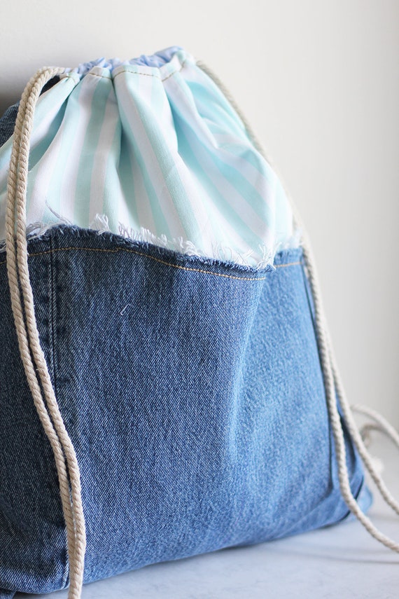 Denim drawstring backpack hotsell