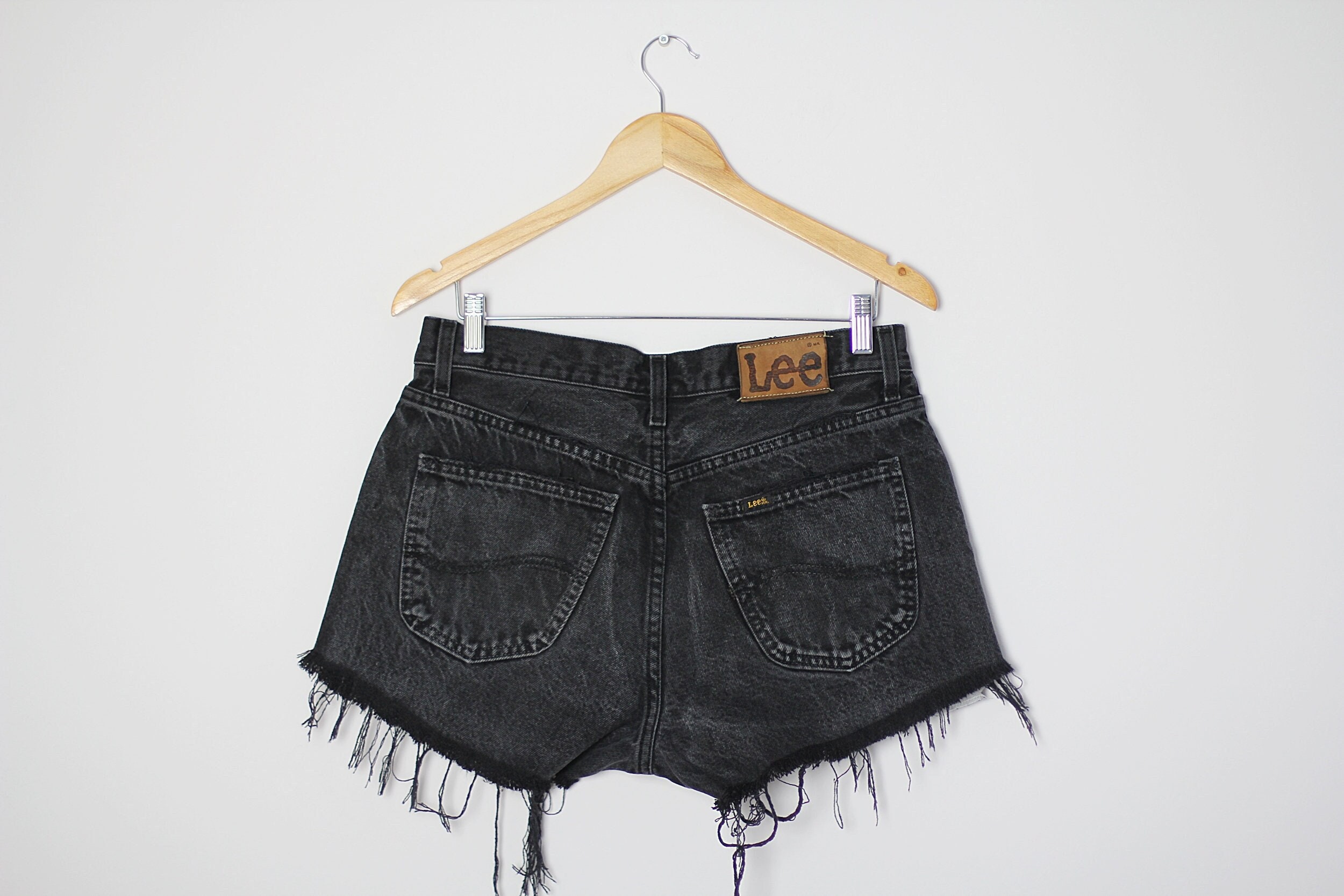 Black shredded shorts best sale