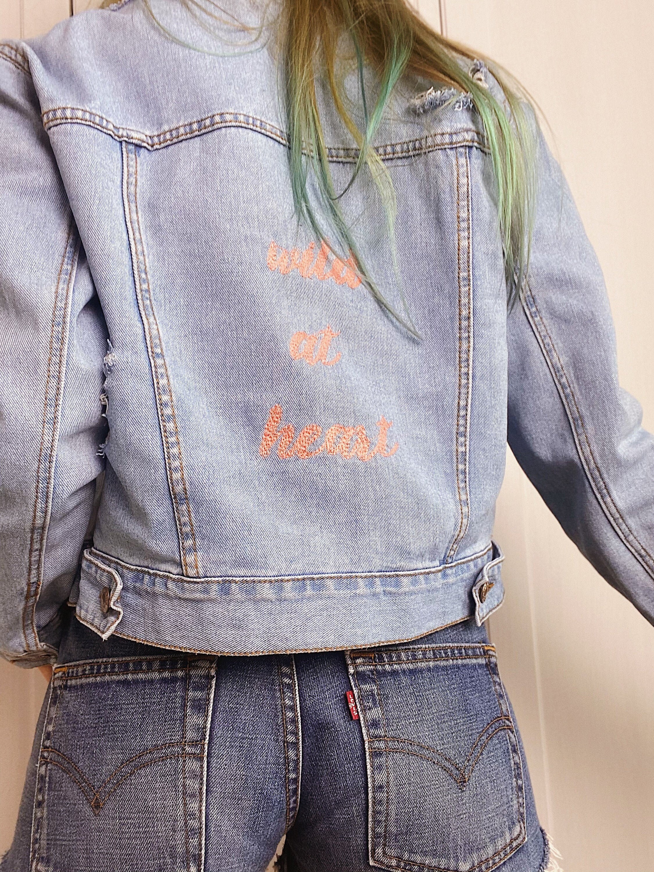 pink ripped denim jacket