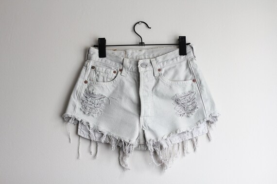 levi's 501 high rise short with raw hem and rips