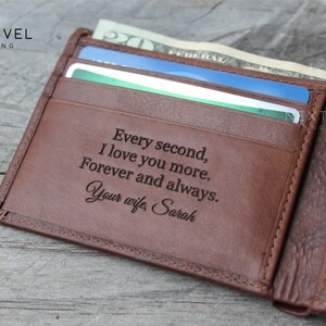 May include: A brown leather wallet with a personalized inscription that reads "Every second, I love you more. Forever and always. Your wife, Sarah".