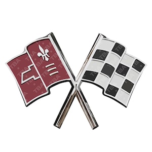 May include: A chrome emblem featuring two crossed flags. One flag is maroon with a white fleur-de-lis, the Chevrolet logo, and three horizontal lines. The other flag is a checkered pattern of black and white squares.