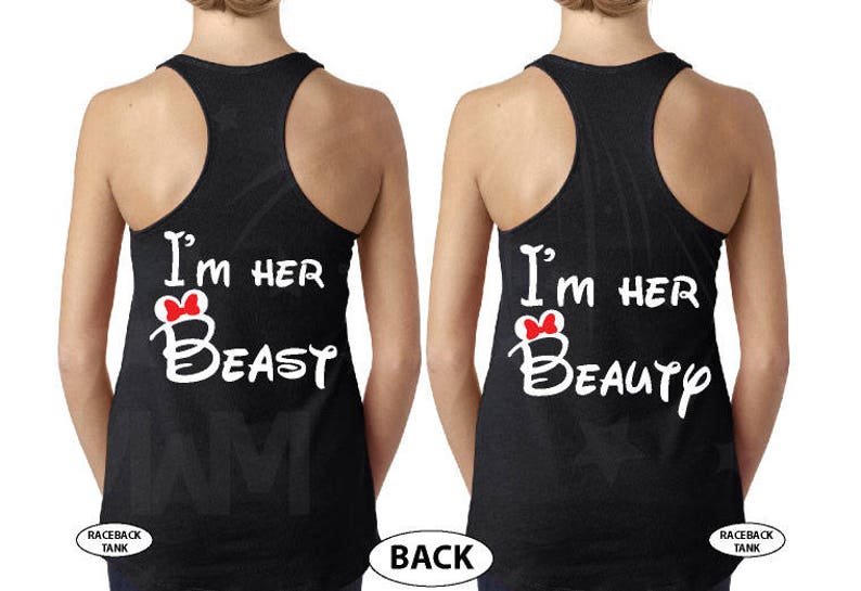 May include: Two black racerback tank tops with white text that reads "I'm her Beast" and "I'm her Beauty". Each tank top has a red bow on the text.