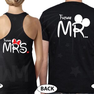 May include: A black tank top with the text "Future Mrs." in white with a red bow and a white Mickey Mouse ear design. A black t-shirt with the text "Future Mr." in white with a white Mickey Mouse ear design.