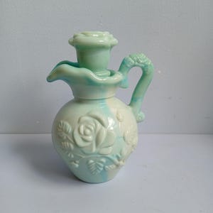 Vintage Avon skin so soft oliekarafvaas, turquoise melkglas gemaakt in Engeland jaren 1970