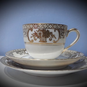 Vintage Noritake gold white and cream teacup and saucer trio, with raised gold floral design made in Japan 1920s
