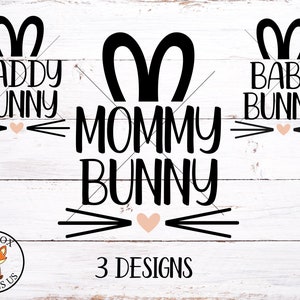 May include: Three bunny-themed designs with the text "Daddy Bunny," "Mommy Bunny," and "Baby Bunny." Each design includes bunny ears, whiskers, and a heart. The image also features a logo with a fox and the text "3 Designs."