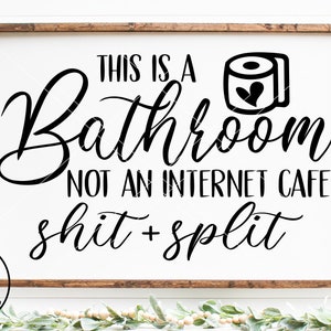 May include: A white sign with black text that reads "This is a Bathroom, Not an Internet Cafe, Shit + Split". A black and white illustration of a toilet paper roll with a heart on it is above the text.