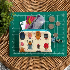 Jolie pochette lumineuse avec des insectes brillants · Porte-monnaie · Mini portefeuille porte-clés · Petite pochette zippée