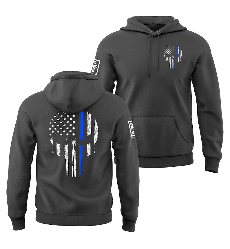 May include: Two charcoal gray hoodies with a distressed skull design. The skull is a combination of the American flag and a blue line. The hoodies have a front pocket and a hood. The design is on the front and back of the hoodies.