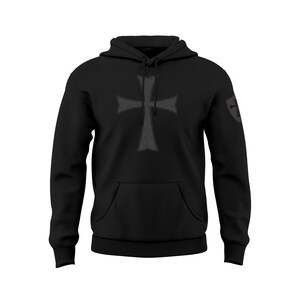 May include: Black hooded sweatshirt with a large gray cross on the front and a smaller gray cross on the left sleeve.