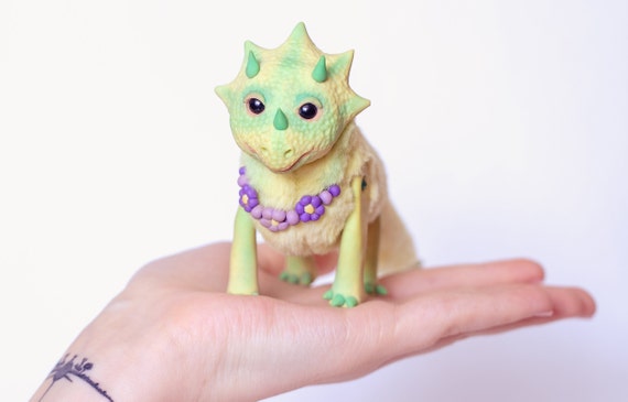 dinosaur art doll