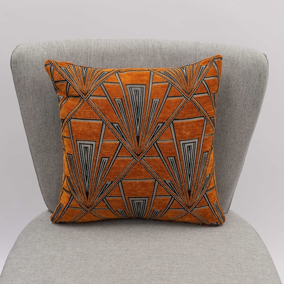 Orange geometric cushion top