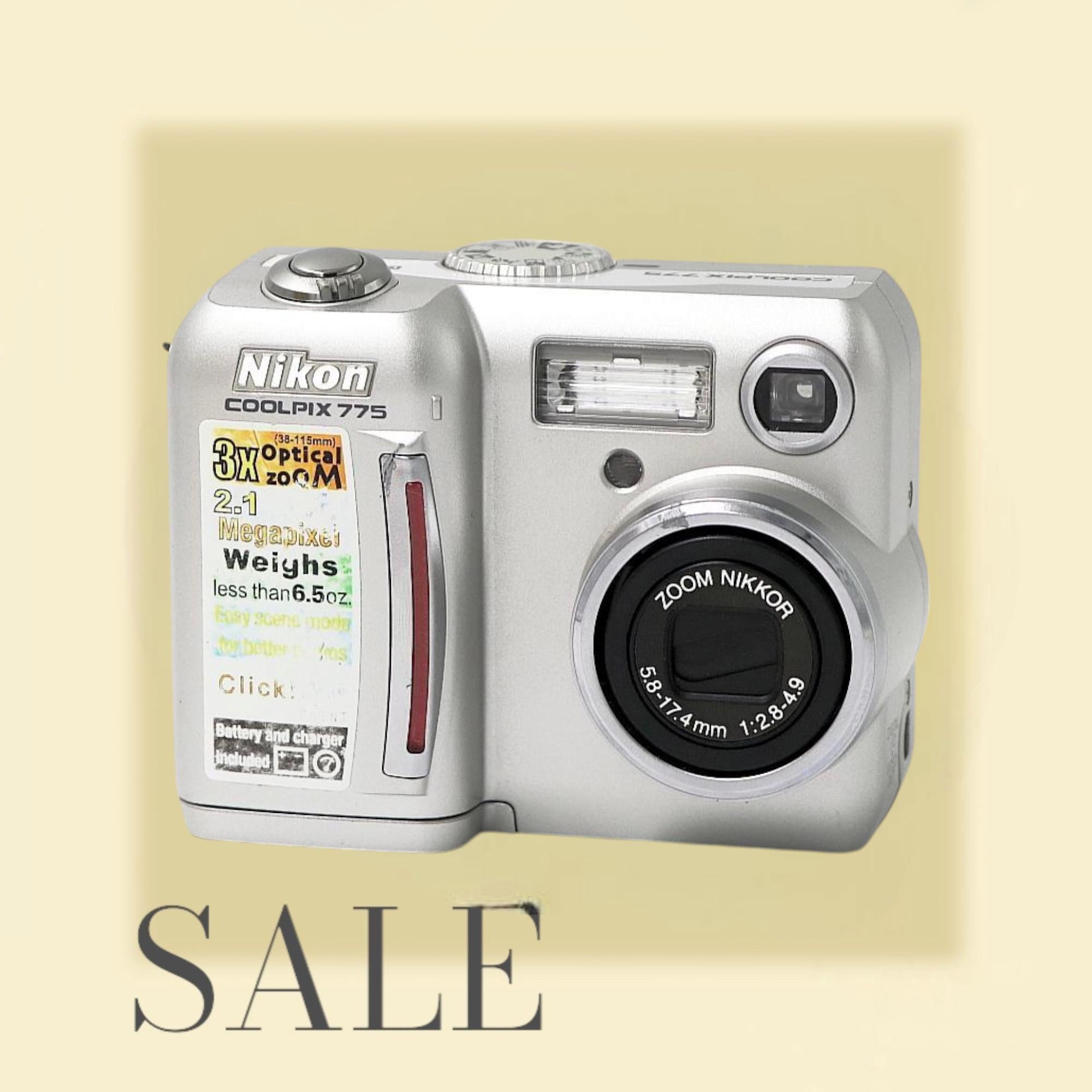 Nikon Coolpix 775 Silver - Vintage Digital Camera. Point and Nikon Coolpix 775 Silver - Vintage Digital Camera. Point and