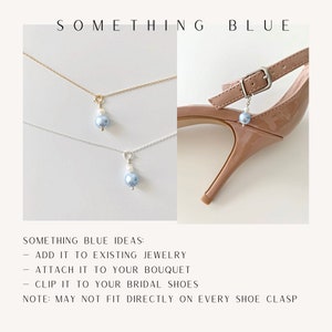 May include: A blue pearl charm with a small white bead on a silver-tone jump ring. The text SOMETHING BLUE, SOMETHING BLUE IDEAS: ADD IT TO EXISTING JEWELRY, ATTACH IT TO YOUR BOUQUET, CLIP IT TO YOUR BRIDAL SHOES, NOTE: MAY NOT FIT DIRECTLY ON EVERY SHOE CLASP.