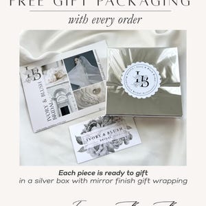 May include: A square silver box with a mirror finish, featuring a round white sticker with the text Ivory & Blush Bridal. Included are two rectangular cards with floral graphics and the text Ivory & Blush Bridal, showcasing product imagery.