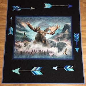 Canadian handmade moose and deer lap quilt. Ready to ship tomorrow. Perfect gift for any outdoors nature lover. Soft minky on the back