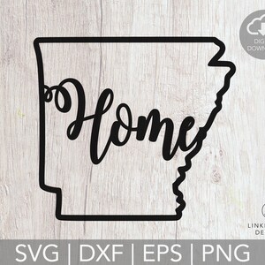 May include: Black cut-out of the state of Arkansas with the word "Home" in a cursive font. The design includes the text "DIGITAL DOWNLOAD" and file type options: SVG, DXF, EPS, and PNG. The background is a light wood grain.