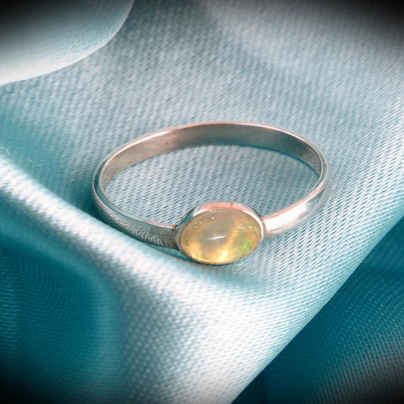 Handmade Sterling Silver Opal Ring: 5x7mm Oval Ethiopian Fire Opal