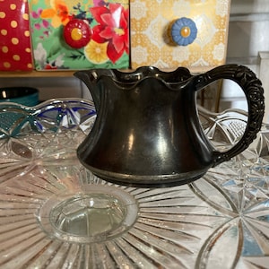 Sweet little Meriden Quadruple Plate Flat Bottom Creamer