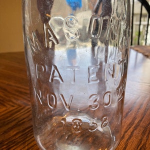 Antique Clear Half Gallon Mason’s Patent 1858 Jar with Zinc Lid