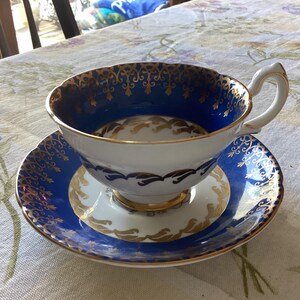 Stunning Vintage English Teacup and Saucer Royal Grafton Fine Bone China Made in England