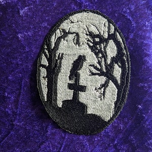Raven on headstone embroidered patch black and white