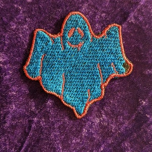 blue and pink ghost embroidered patch