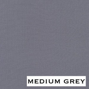 May include: A solid medium gray fabric swatch.