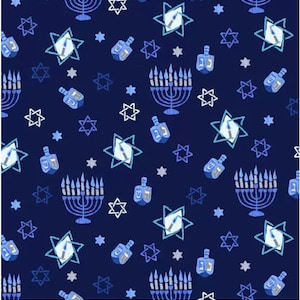 May include: A navy blue fabric with a repeating pattern of blue and white menorahs, blue and white stars of David, and blue dreidels. The pattern is on a dark blue background.