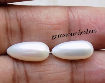 Par de perlas de agua dulce lisas en forma de lágrima, color blanco marfil, 7,5 x 16 mm.