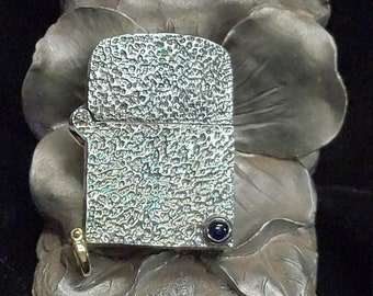 Sterling silver zippo lighter case, bezel stone set, brass shackle, over 100 grams of silver,new. Made in USA