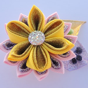 Kanzashi fabric flower brooch .