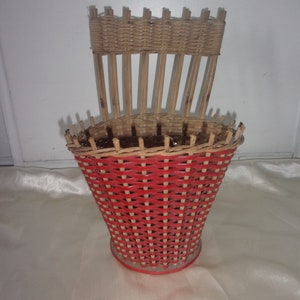 Handcrafted plant holder in braided wicker