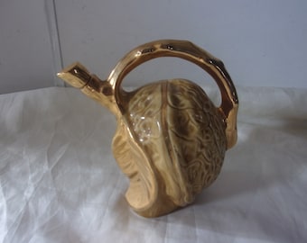 Nut-shaped liquor decanter from the 50s
