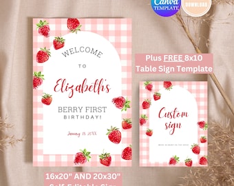 Könnte beinhalten: Zwei bedruckbare Schilder mit Erdbeermotiv. Das größere Schild lautet "Willkommen zu Elizabeth's Berry First Birthday!" und das kleinere Schild "Custom sign". Beide Schilder haben einen rosa Vichy-Hintergrund und Erdbeerillustrationen.