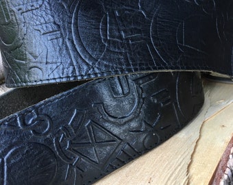 Real / genuine leather vintage hand tooled / embossed wide black belt.