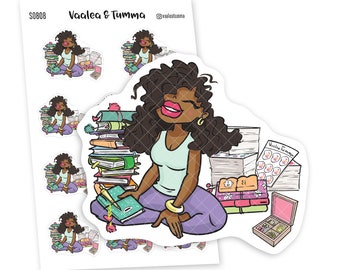 May include: A sticker sheet featuring a cartoon illustration of a woman sitting with a stack of books, surrounded by other book-themed stickers. The text "Vaalea & Tumma" is at the top of the sheet.