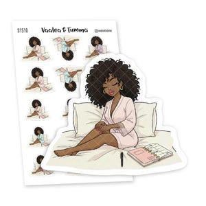May include: A sticker sheet and a die-cut sticker featuring a cartoon woman with dark skin and curly hair. The woman is wearing a pink robe and sitting on a bed. The sticker sheet has multiple smaller versions of the same image. The text "Vaalea & Tumma" is visible.