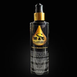May include: A black bottle with a gold cap and label. The label reads "M&G Deep Penetrating Conditioner Protein & Moisture Balance".