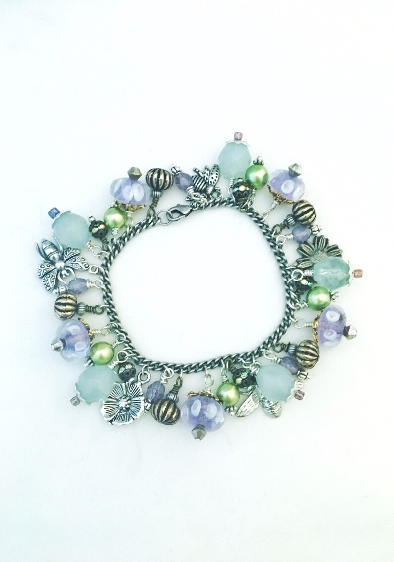 Silver charm and bead bracelet. Flowers and bees. Sea glass Etsy
