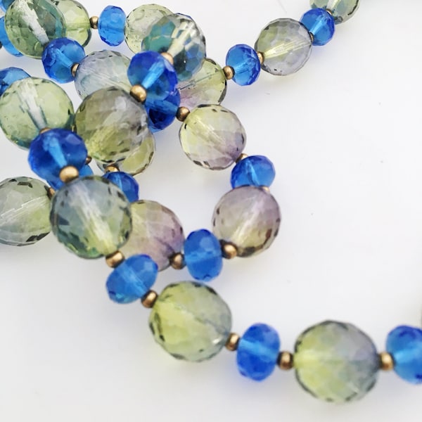 Joan Rivers long crystal vintage necklace. Blue and green faceted beads.  Top quality.  Wear with sweater.